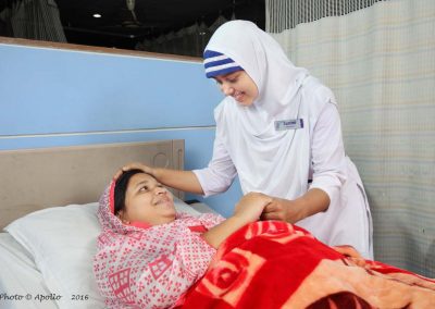 Health=Photo by Apollo-Addin-Nrs_185=A student nurse is caring a patient in a hospital, Dhaka, Bangladesh.